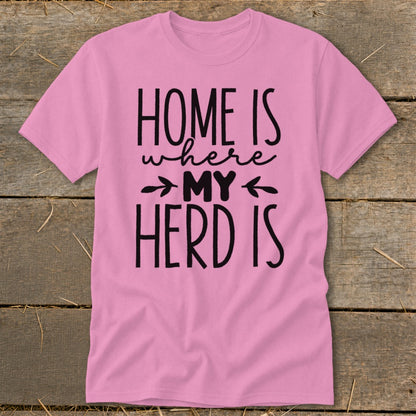 Pink t-shirt with black text that reads "HOME IS where MY HERD IS".