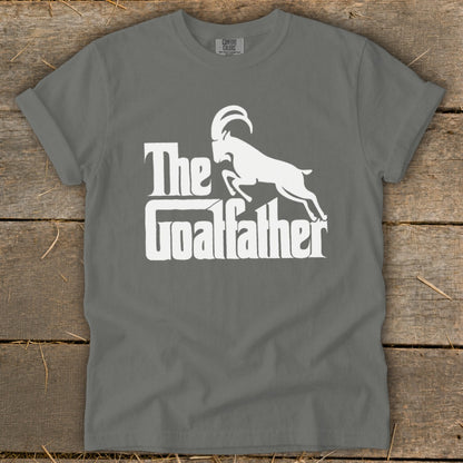 Grey t-shirt with white text and graphics: "The Goalfather" and a goat.