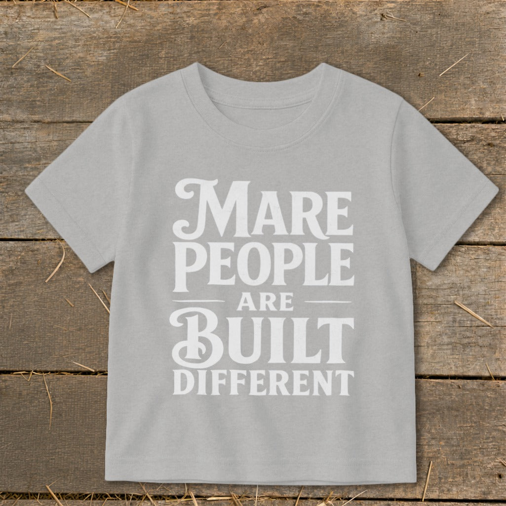 Grey t-shirt with white text that reads "Mare people are built different."