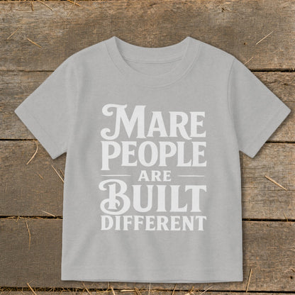 Grey t-shirt with white text that reads "Mare people are built different."