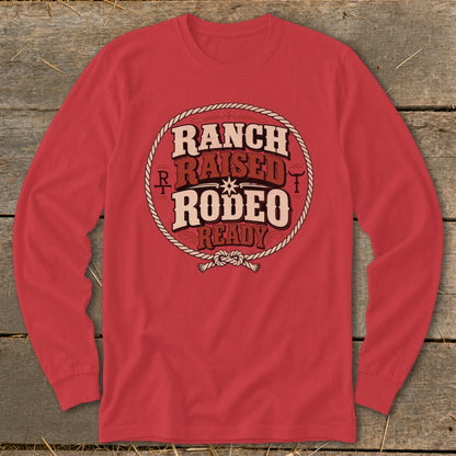 Red long sleeve shirt with "Ranch Raised Rodeo Ready" text in a circle.