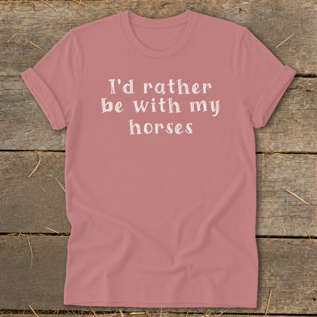 Pink t-shirt with white text that reads "I'd rather be with my horses."