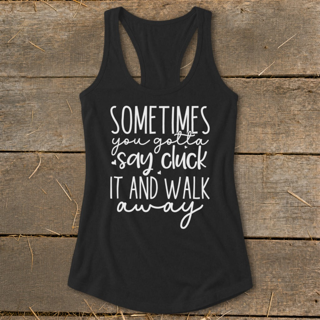 Black tank top with white text that says "Sometimes you gotta say cluck it and walk away."