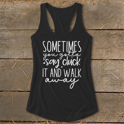 Black tank top with white text that says "Sometimes you gotta say cluck it and walk away."