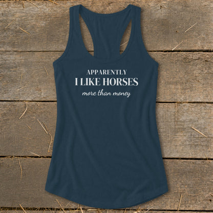 Dark blue tank top with white text: "APPARENTLY I LIKE HORSES more than money"