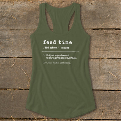 Green tank top with "feed time" definition including "daily stampede event".