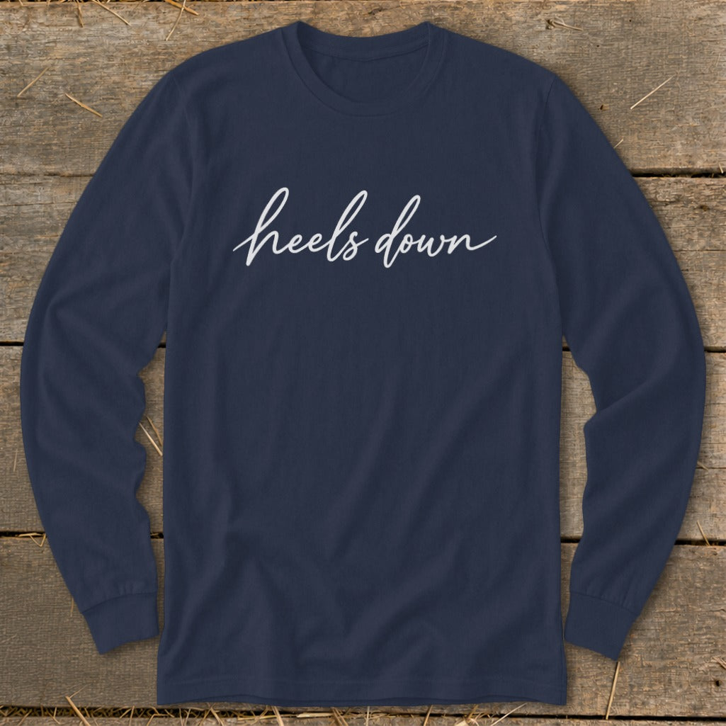 Navy long sleeve shirt with white "heels down" text.