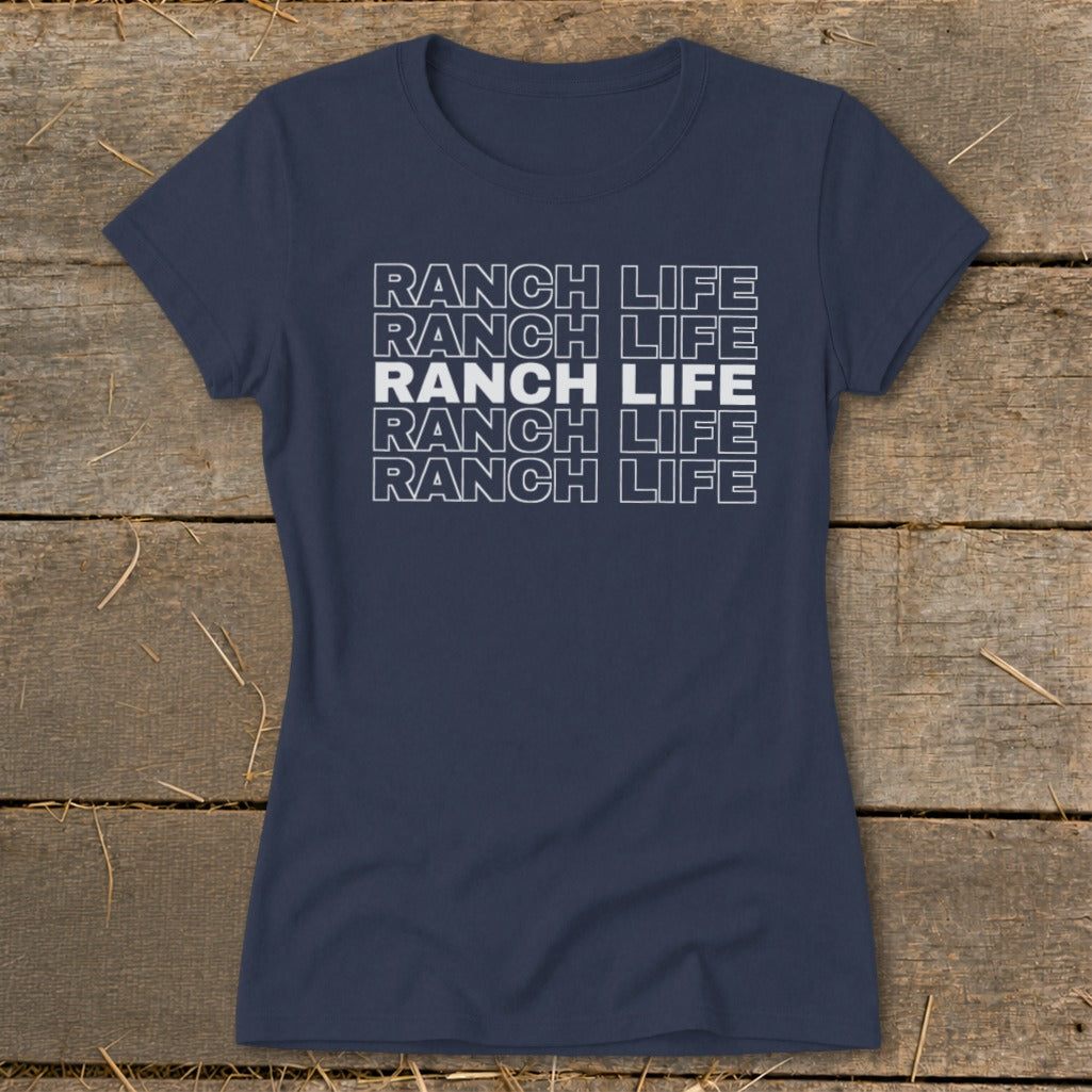 A dark blue crew neck women's t-shirt with the text RANCH LIFE printed in white five times stacked vertically.
