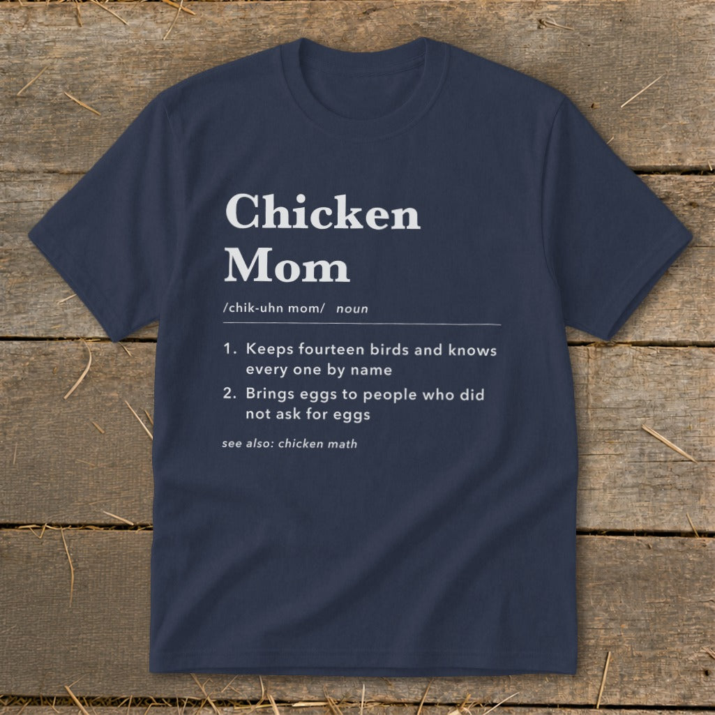 Navy t-shirt with "Chicken Mom" definition text: Keeps fourteen birds and knows every one by name.