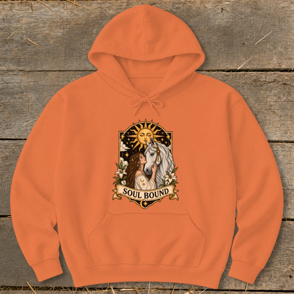 Orange hoodie with a sun, woman, and horse graphic and "Soul Bound" text.