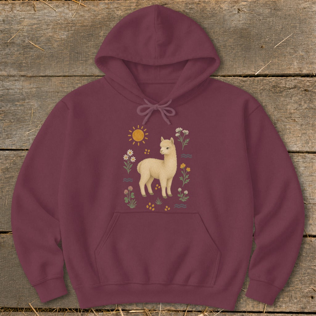 Maroon hoodie with a cream alpaca, sun, and wildflowers graphic.