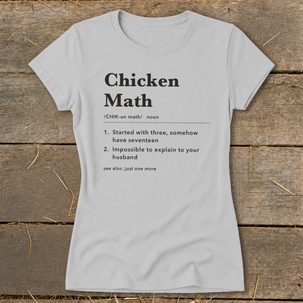 Light grey t-shirt with black text defining "Chicken Math" and its humorous meaning.