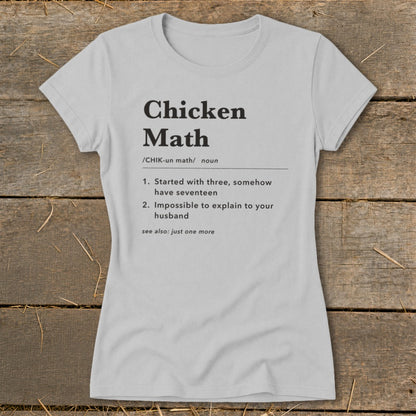 Light grey t-shirt with black text defining "Chicken Math" and its humorous meaning.