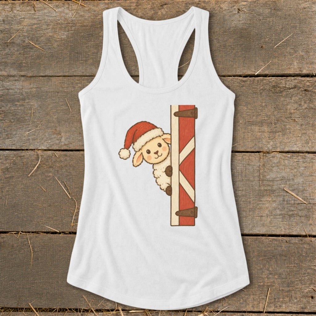 White tank top with a sheep wearing a Santa hat peeking behind a red barn door.