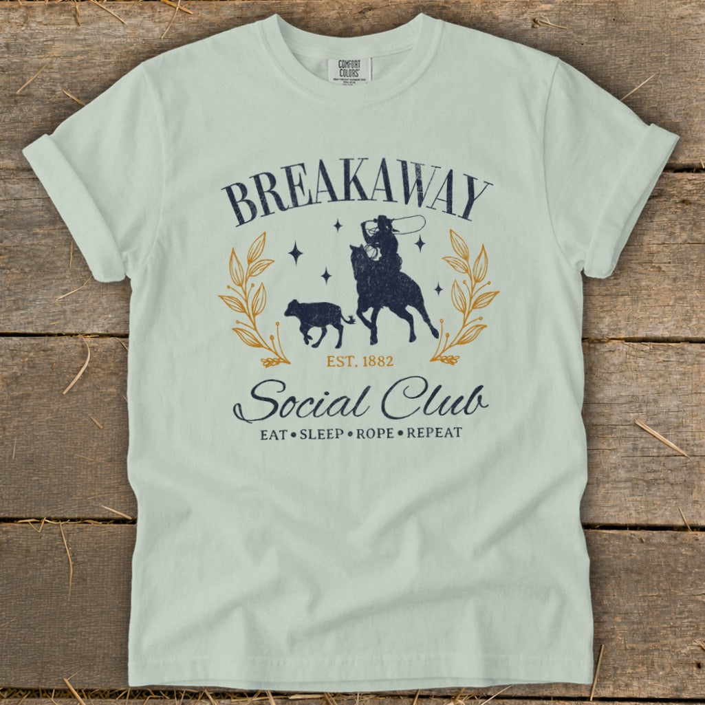 Breakaway Social Club t-shirt with cowboy, calf, and rustic text.