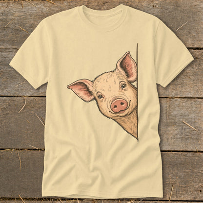 Light yellow t-shirt with a hand-drawn illustration of a pig peeking from the side.