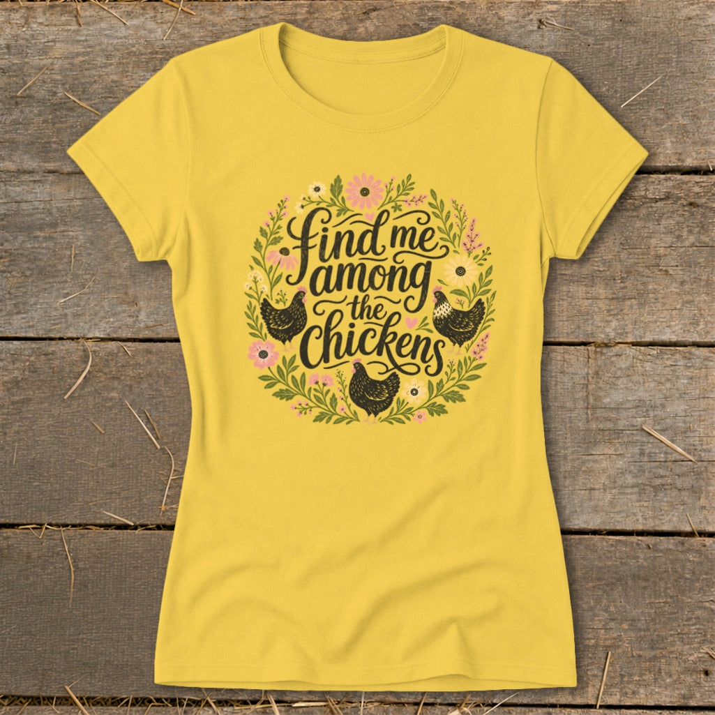 Yellow t-shirt with "Find me among the chickens" text and floral chicken design.