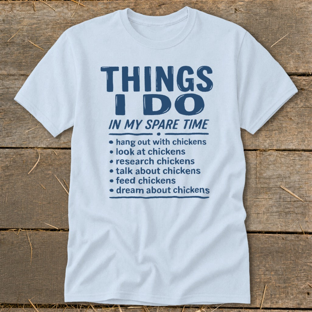 Light blue t-shirt with "Things I Do In My Spare Time" and a list about chickens.