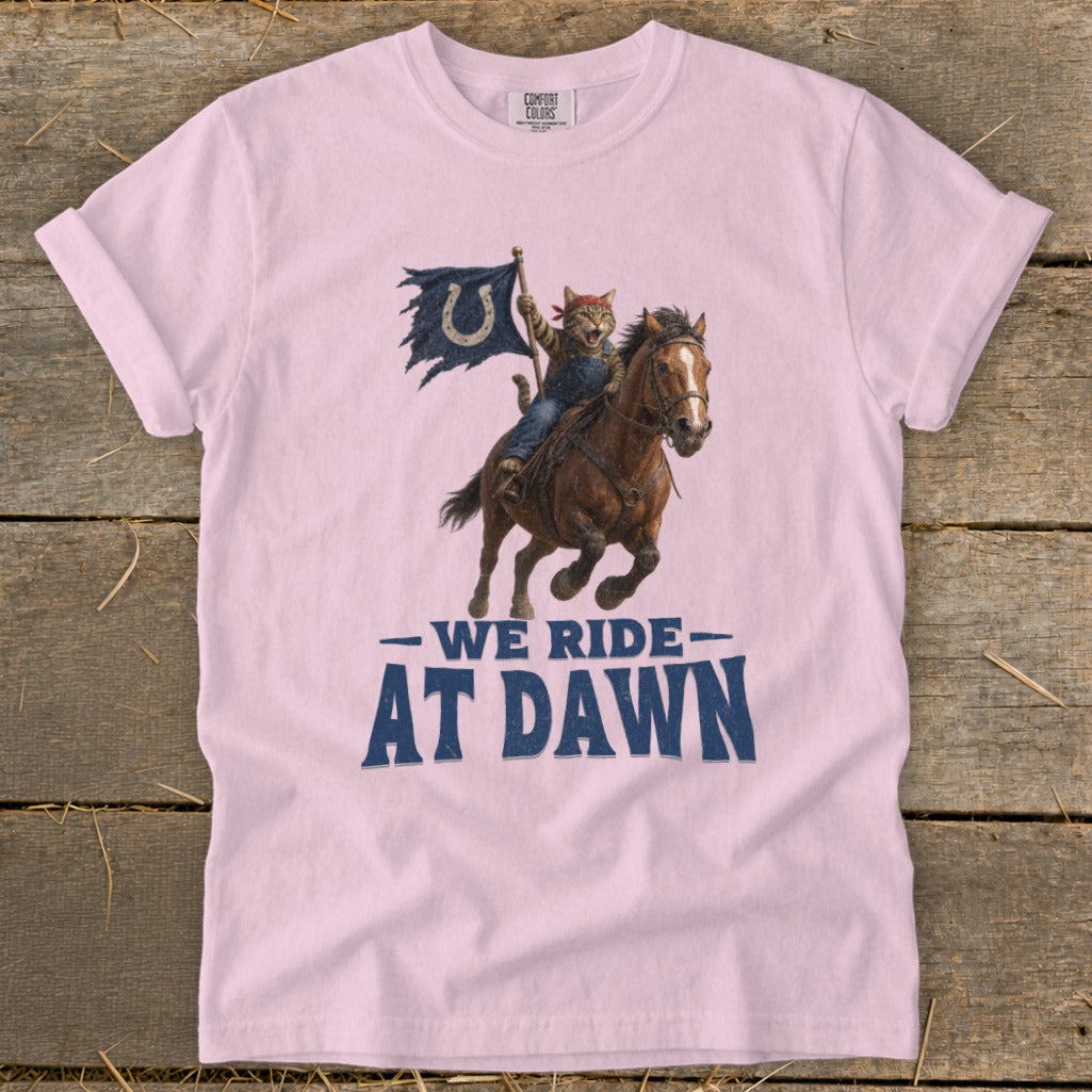 Cat in overalls rides a horse, waving a flag with text "WE RIDE AT DAWN".
