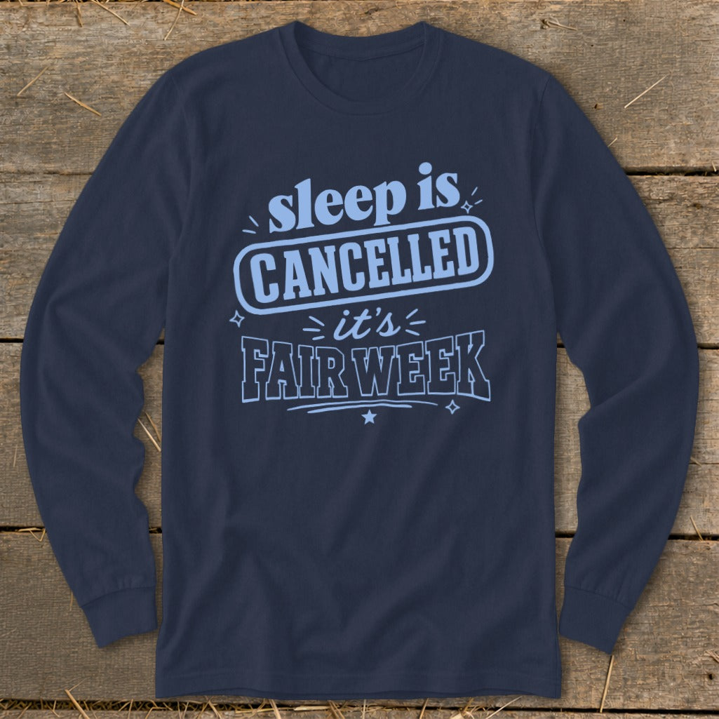 Navy long-sleeve shirt with light blue text: "sleep is CANCELLED it's FAIR WEEK".