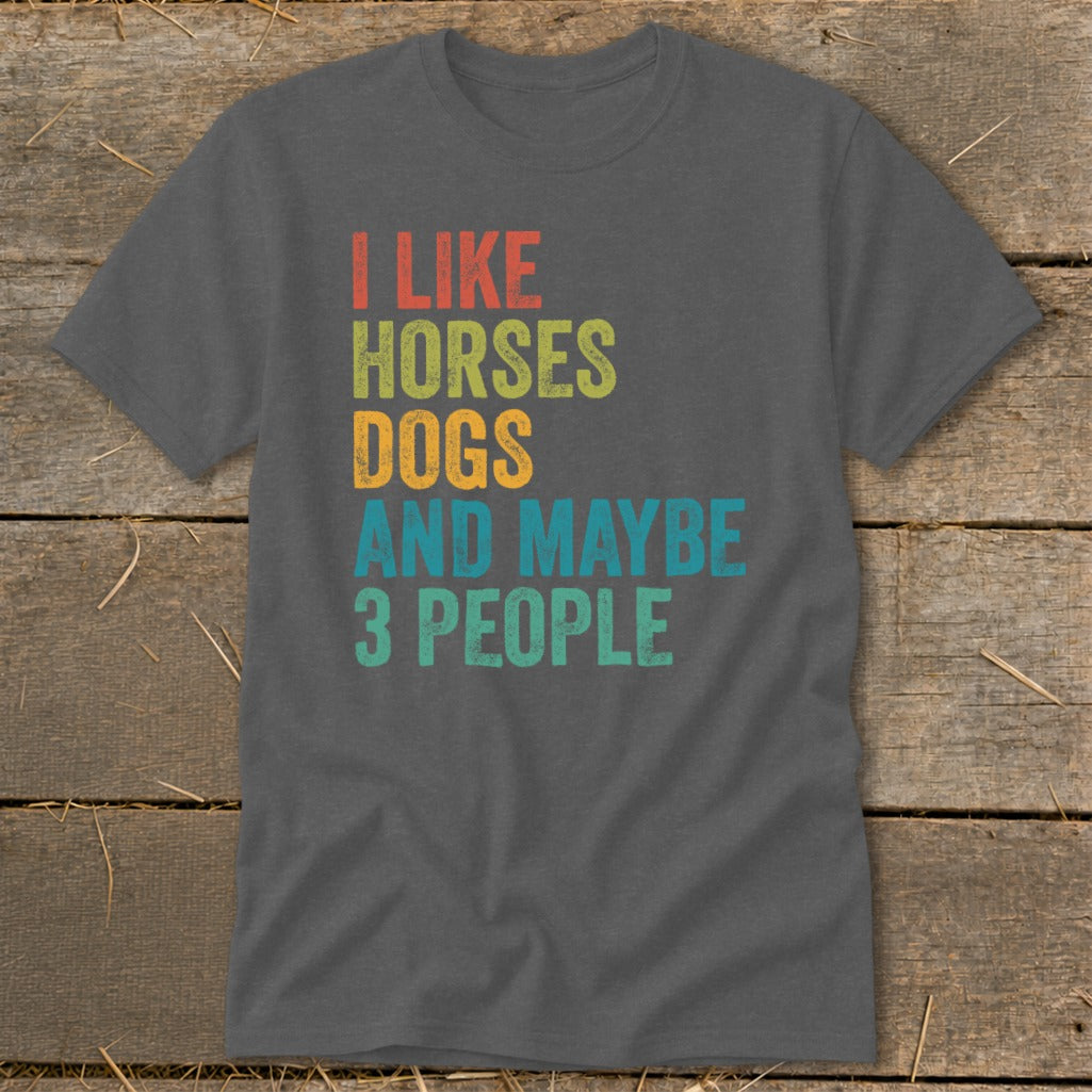 Dark gray t-shirt with text "I LIKE HORSES DOGS AND MAYBE 3 PEOPLE".