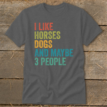 Dark gray t-shirt with text "I LIKE HORSES DOGS AND MAYBE 3 PEOPLE".