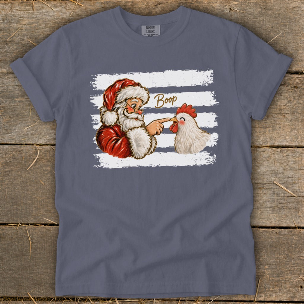 Santa boops a chicken with text "Boop" on a distressed striped background.