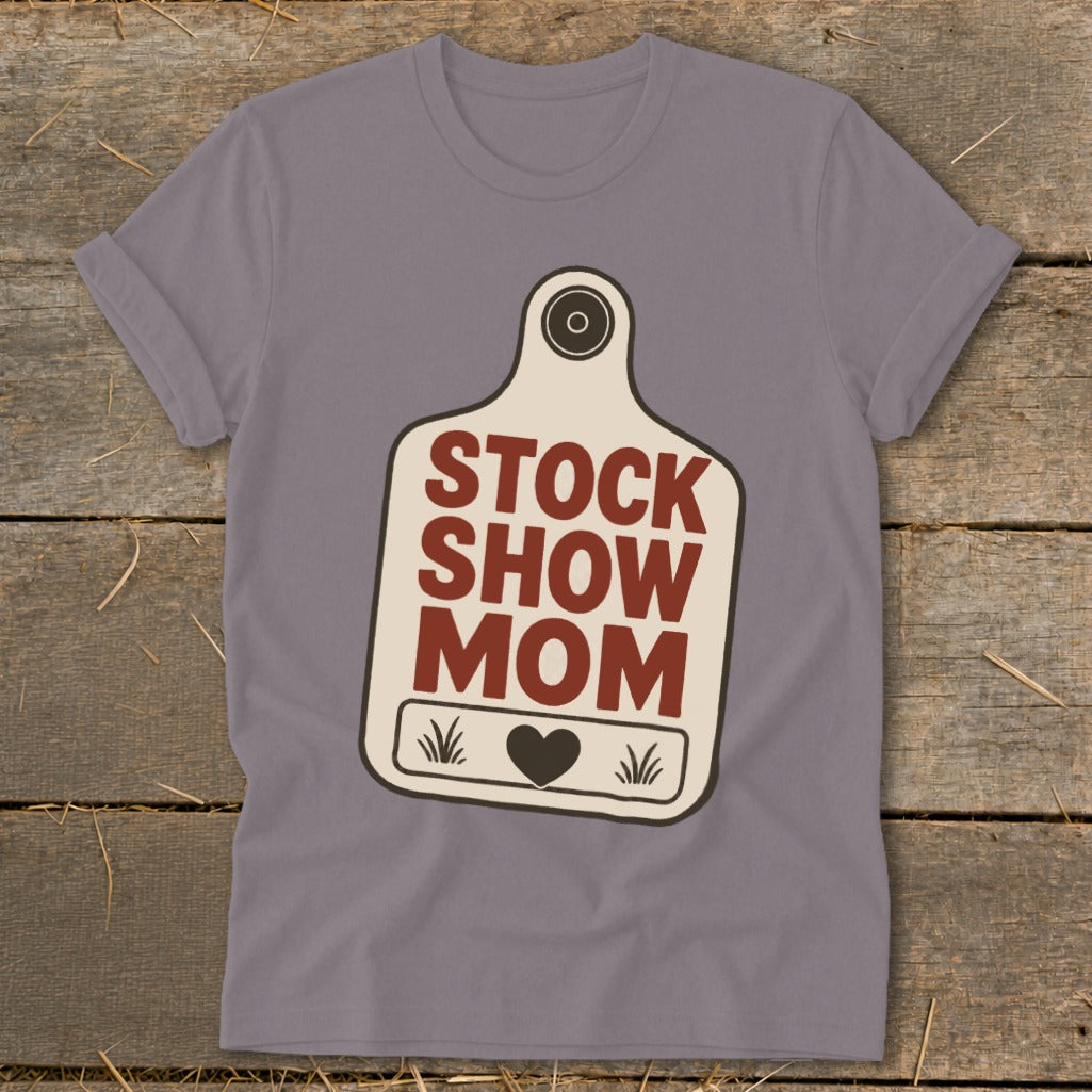 Gray t-shirt with a cow tag design reading "STOCK SHOW MOM" and a heart.