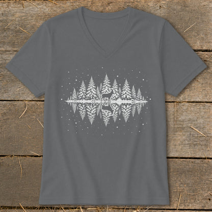 Grey t-shirt with white forest and deer graphic reflected in water.