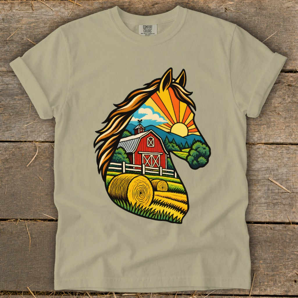 An olive green t-shirt featuring a graphic of a horse head silhouette filled with a farm scene, red barn, and hay bales.