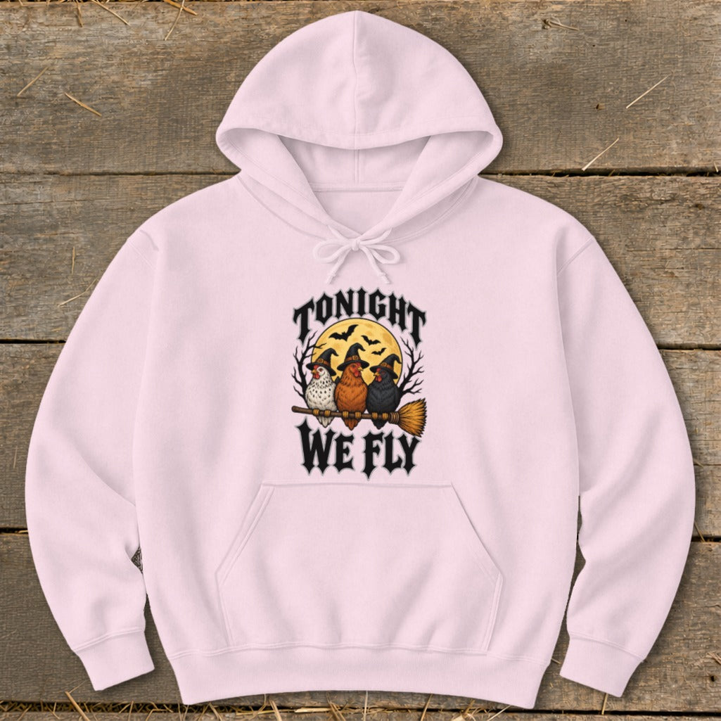 Pink hoodie with "Tonight We Fly" text and three chickens on a broomstick.