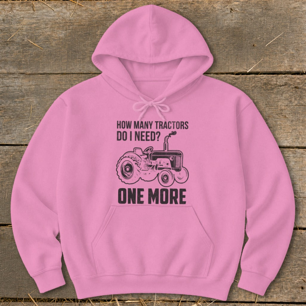 Pink hoodie with "How Many Tractors Do I Need? One More" text and tractor graphic.