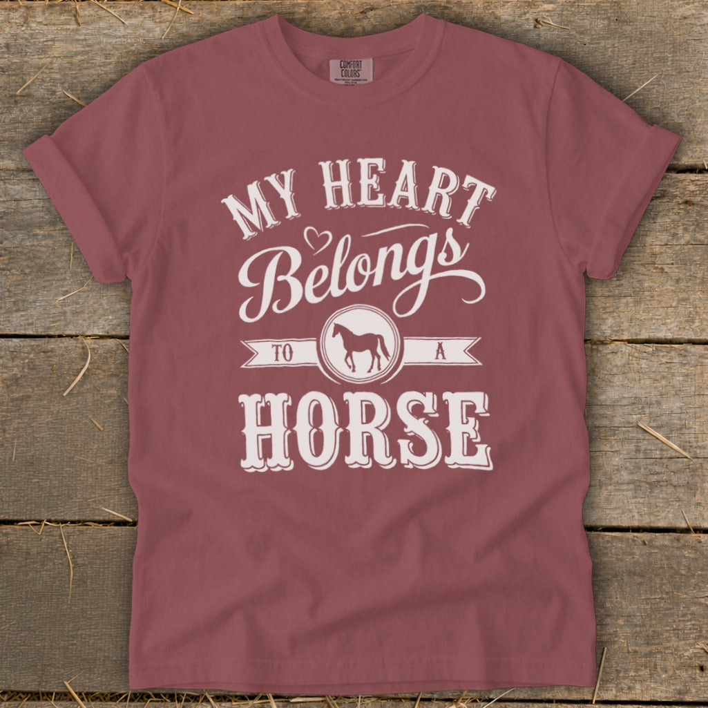 Maroon t-shirt with "My Heart Belongs To A Horse" text and horse graphic.