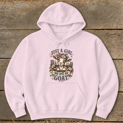 Pink hoodie with a graphic of a goat wearing a flower crown, text reads "Just a girl who loves her goat".