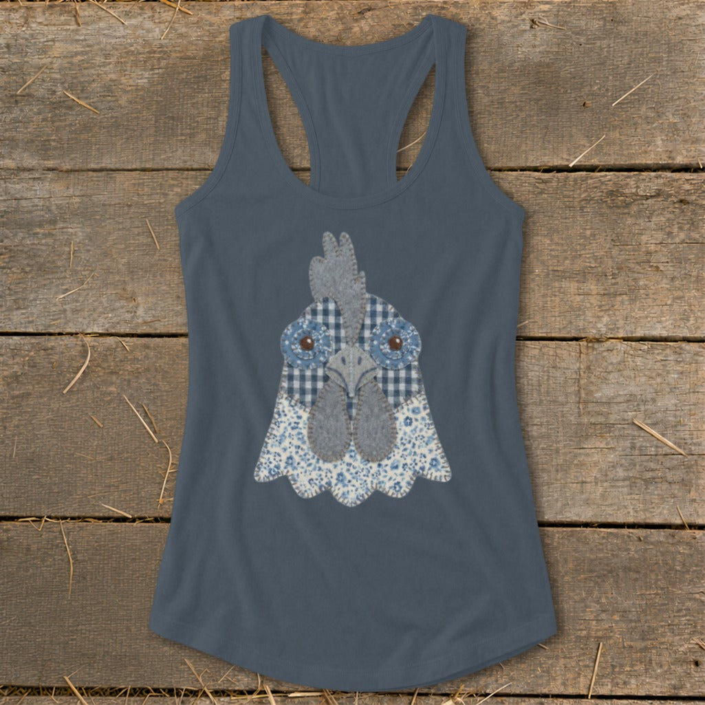 Blue tank top with a fabric applique of a chicken's head.