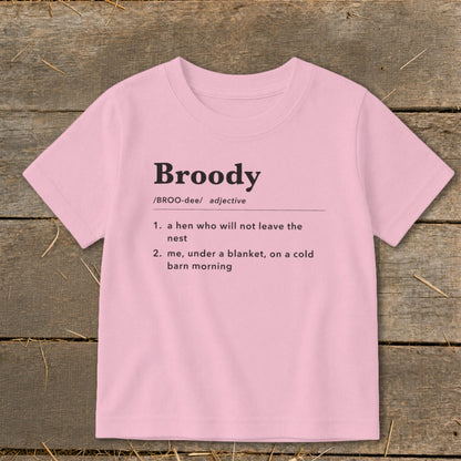 Pink t-shirt with the definition of "Broody" printed on it.