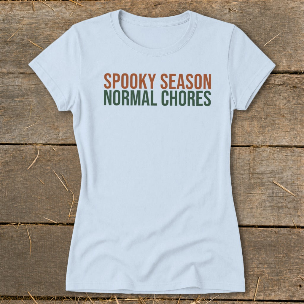 Light blue t-shirt with text "SPOOKY SEASON" and "NORMAL CHORES".