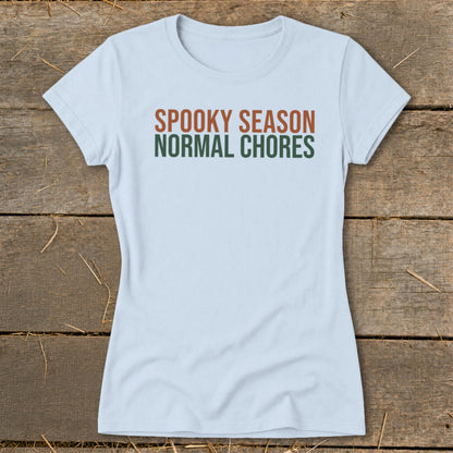 Light blue t-shirt with text "SPOOKY SEASON" and "NORMAL CHORES".