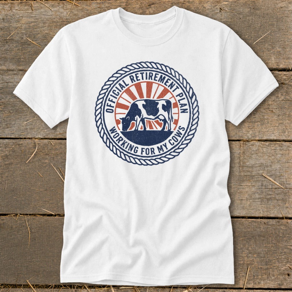 White t-shirt with "Official Retirement Plan Working For My Cows" text and cow graphic.