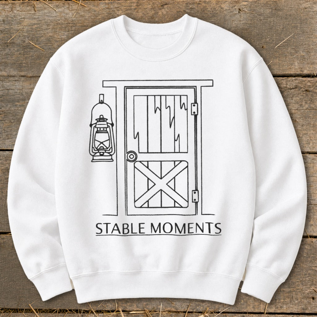White sweatshirt with barn door graphic and text "STABLE MOMENTS".