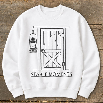 White sweatshirt with barn door graphic and text "STABLE MOMENTS".