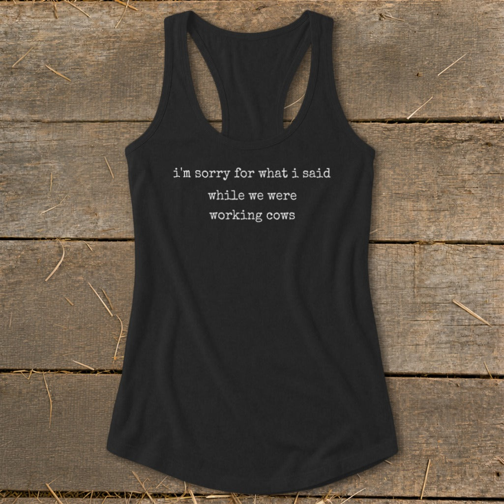 Black tank top with "i'm sorry for what i said while we were working cows" text.
