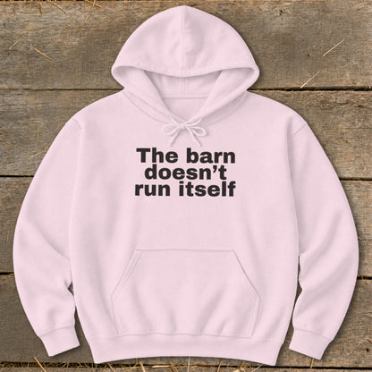 Light pink hoodie with black text "The barn doesn't run itself".