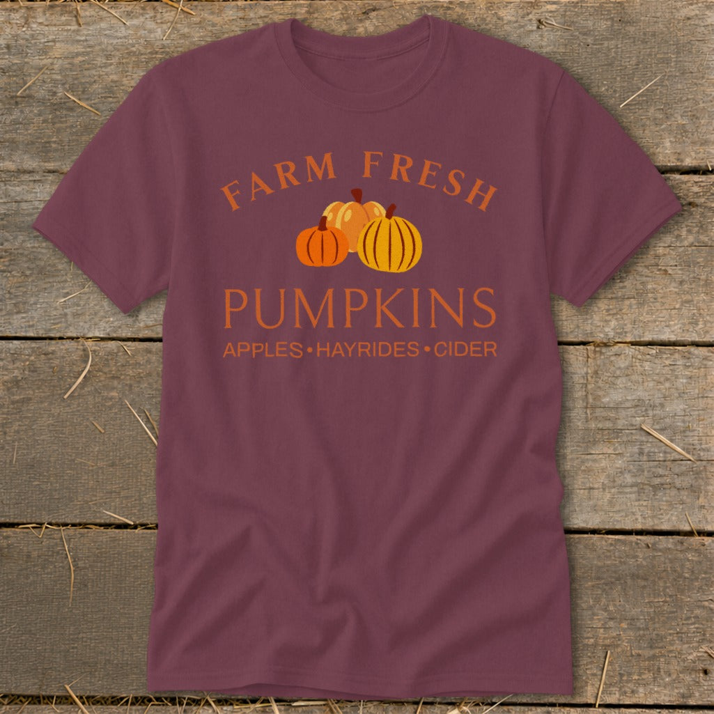Maroon t-shirt with "Farm Fresh Pumpkins" text and three pumpkins.