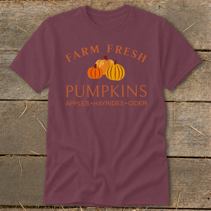 Maroon t-shirt with "Farm Fresh Pumpkins" text and three pumpkins.