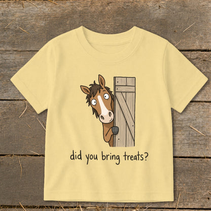 Yellow t-shirt with cartoon horse peeking around a gate asking "did you bring treats?".