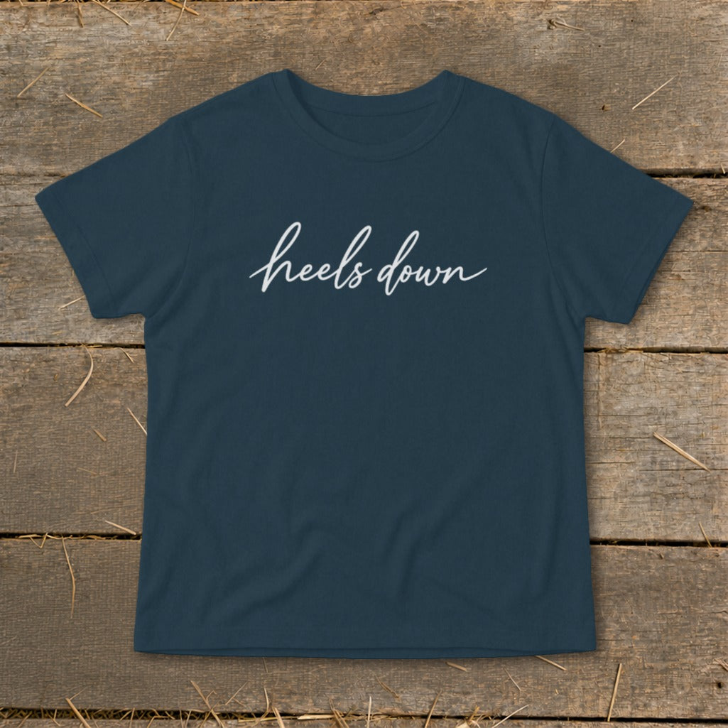 Navy t-shirt with "heels down" in white script text.