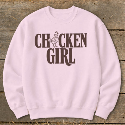 Pink sweatshirt with "CHICKEN GIRL" text and a chicken graphic.