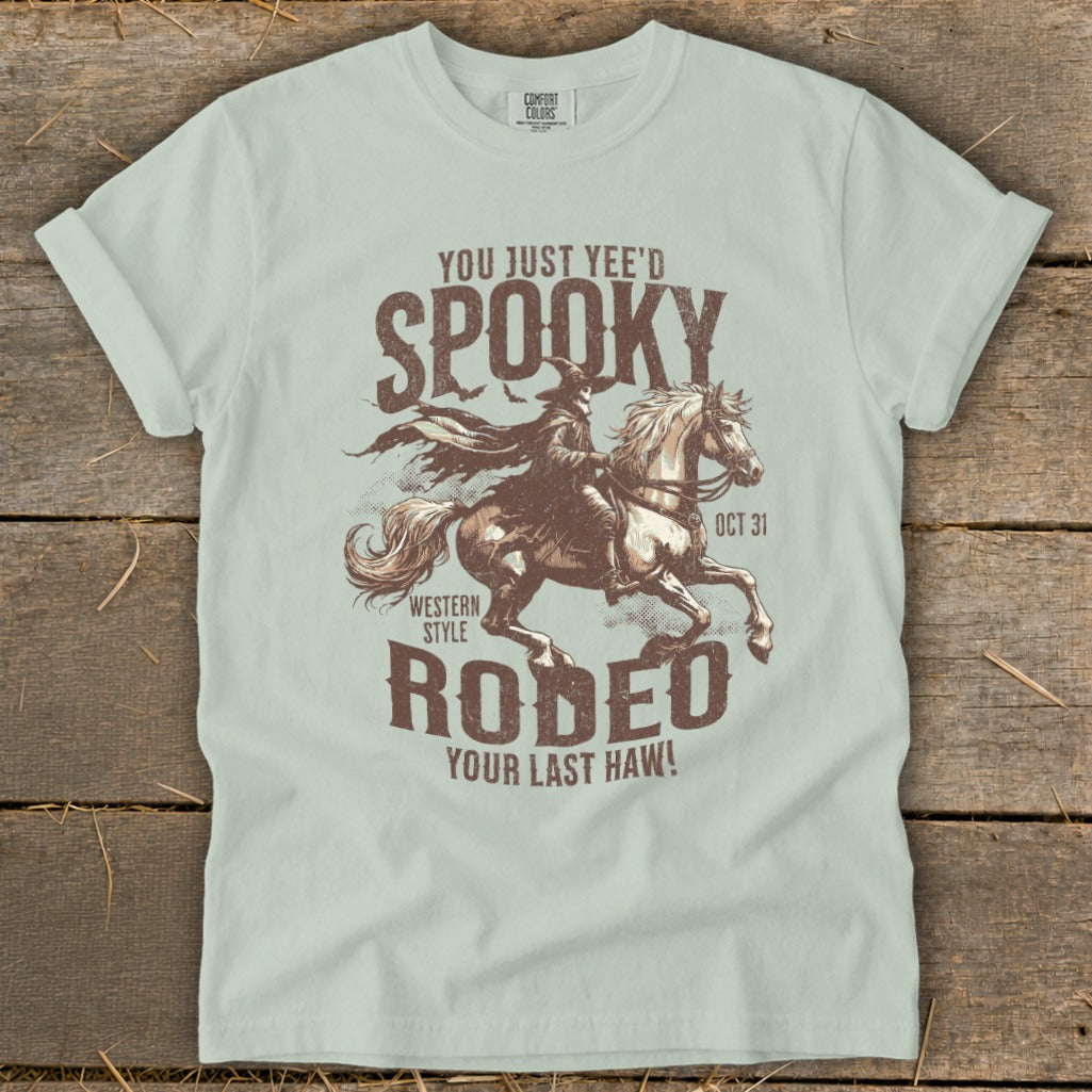 Western style rodeo graphic with a spooky cowboy on a horse and text.