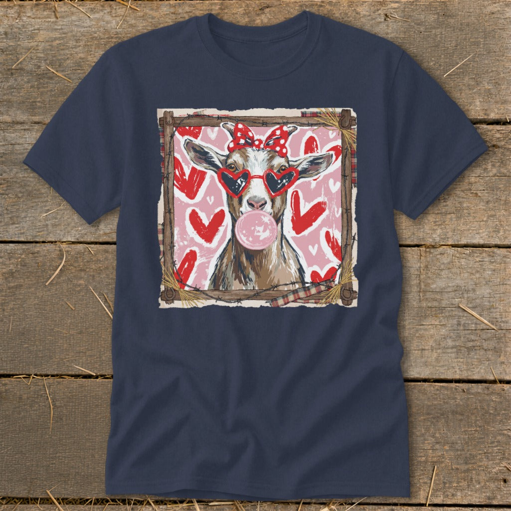 Goat wearing heart sunglasses and a red bow chewing bubblegum with hearts background.